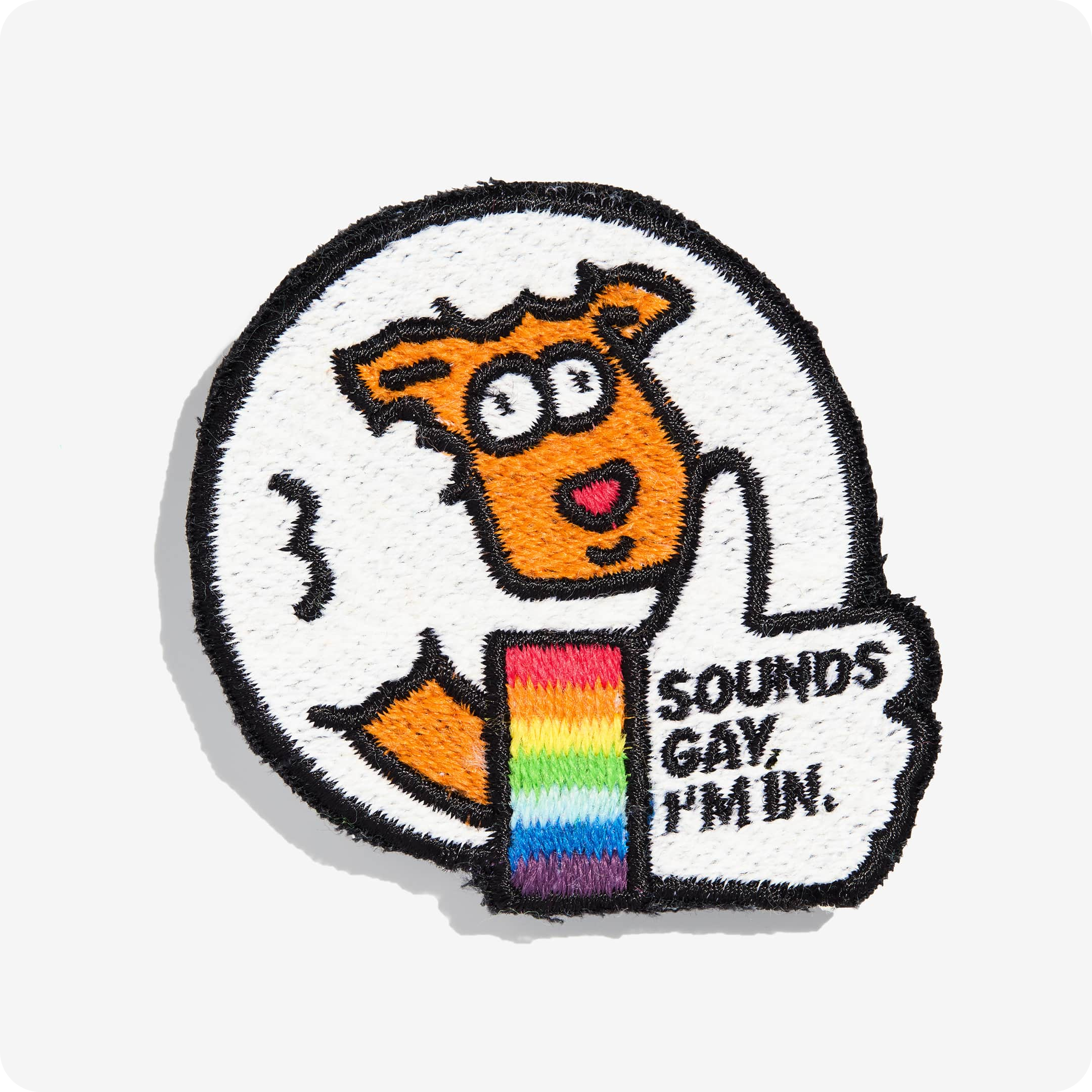 Patch "Sounds gay, I'm in." by Rainbow Wool Patch "Sounds gay, I'm in." made of gay sheep wool on a white background.